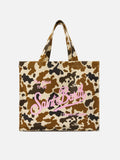 Borsa Essential in canvas con stampa muccata e logo stampato
