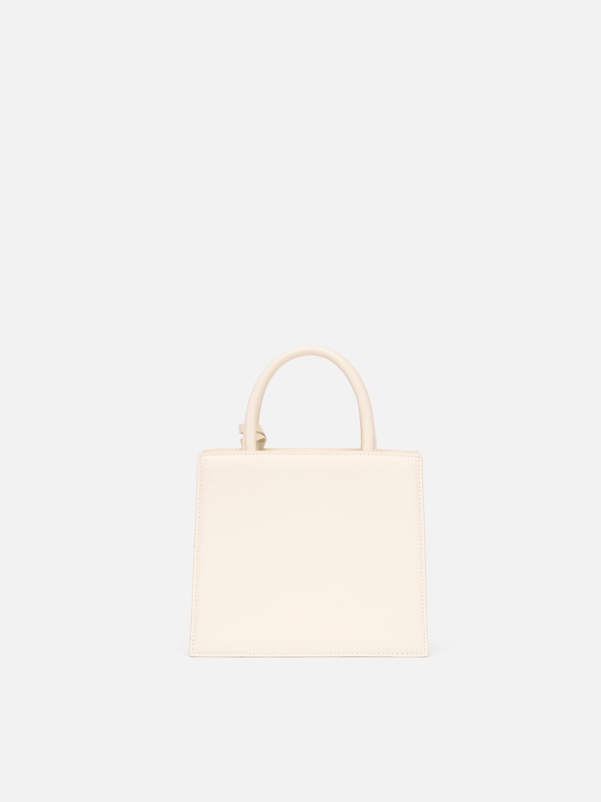 Borsa Shop mini strutturata in pelle liscia bianca con targhetta metallica