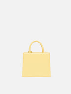 Borsa Shop mini strutturata in pelle liscia giallo tenue con targhetta metallica